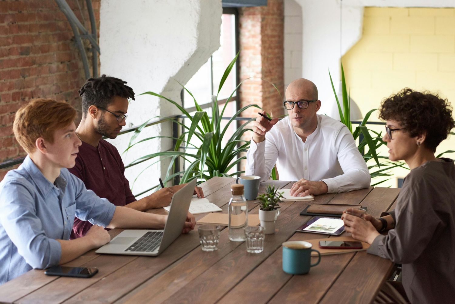 Professional team collaborating on contract management